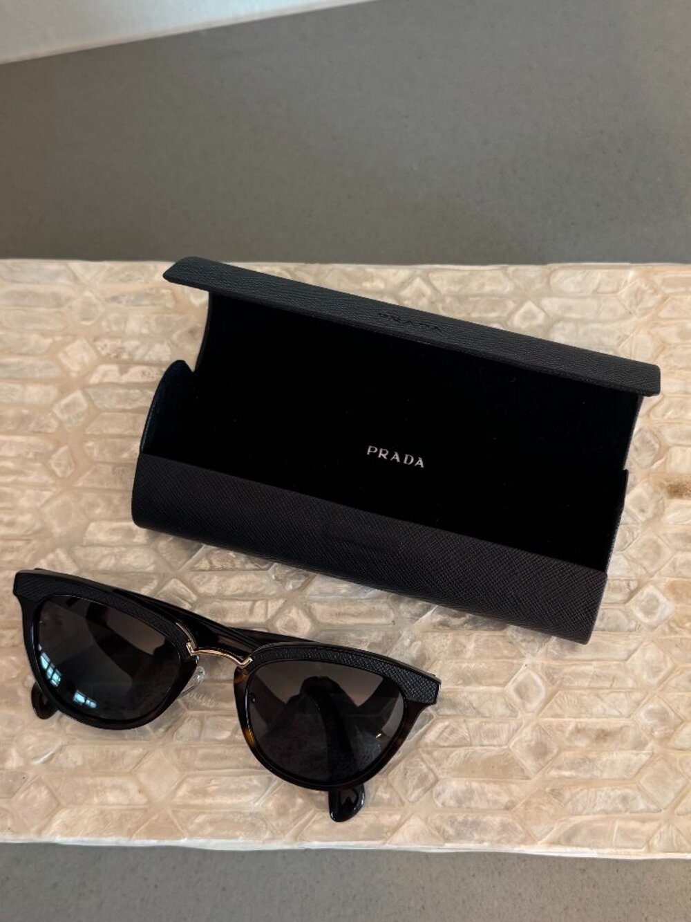 Prada, Made in Italy, Sunglasses or frames for eyeglasses. Tortoiseshell pattern